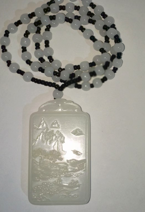 和田羊脂白玉《自在观音吊牌》