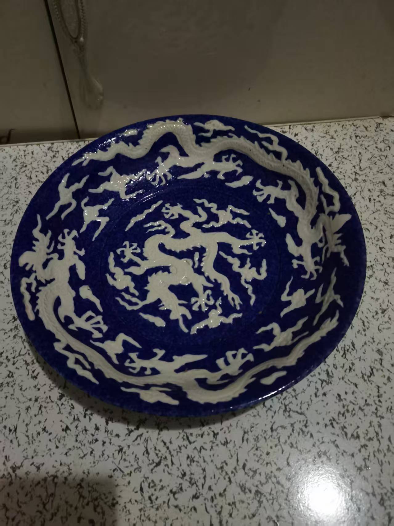 永乐年制《祭蓝釉留白刻龙纹盘》-嘉城艺术交易平台