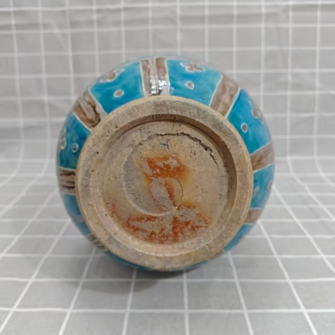 永乐年制《孔雀蓝釉褐彩龙纹玉壶春瓶》