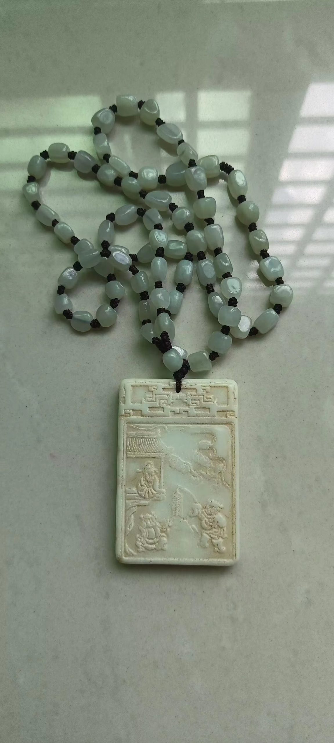 和田玉《清明上河图》子冈牌-嘉城艺术交易平台