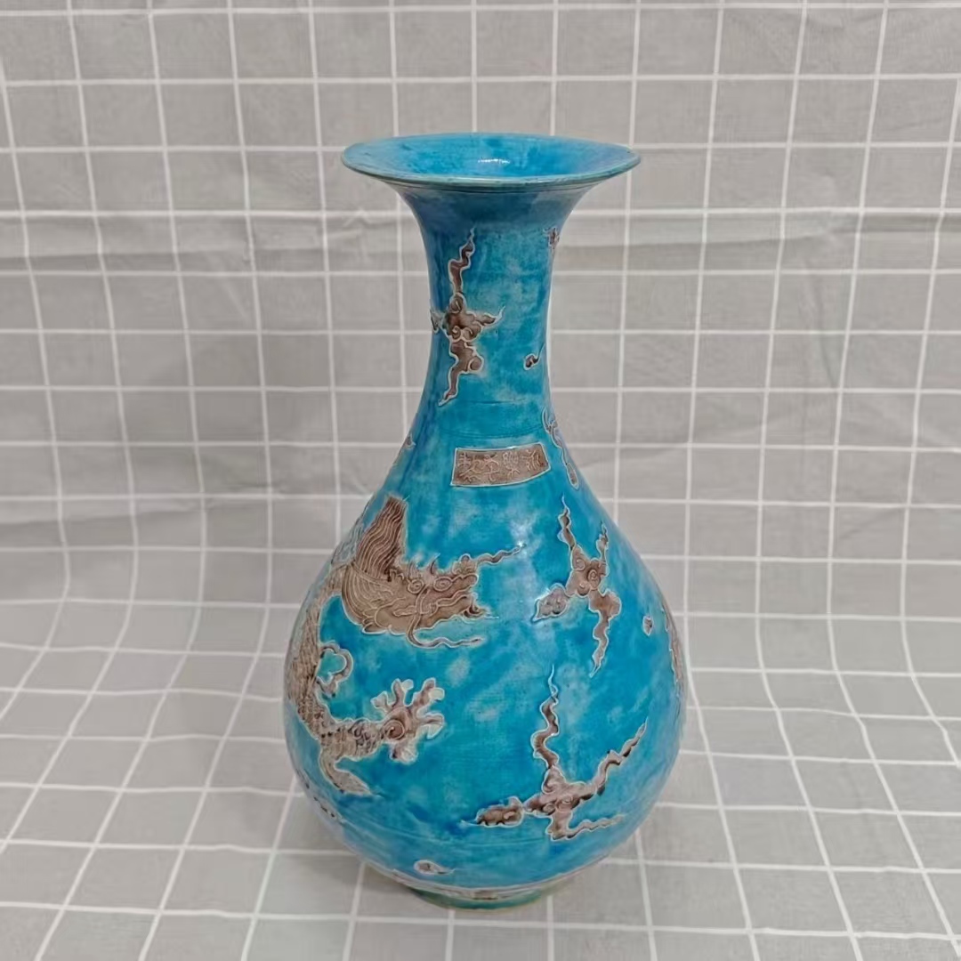 永乐年制《孔雀蓝釉褐彩龙纹玉壶春瓶》-嘉城艺术交易平台