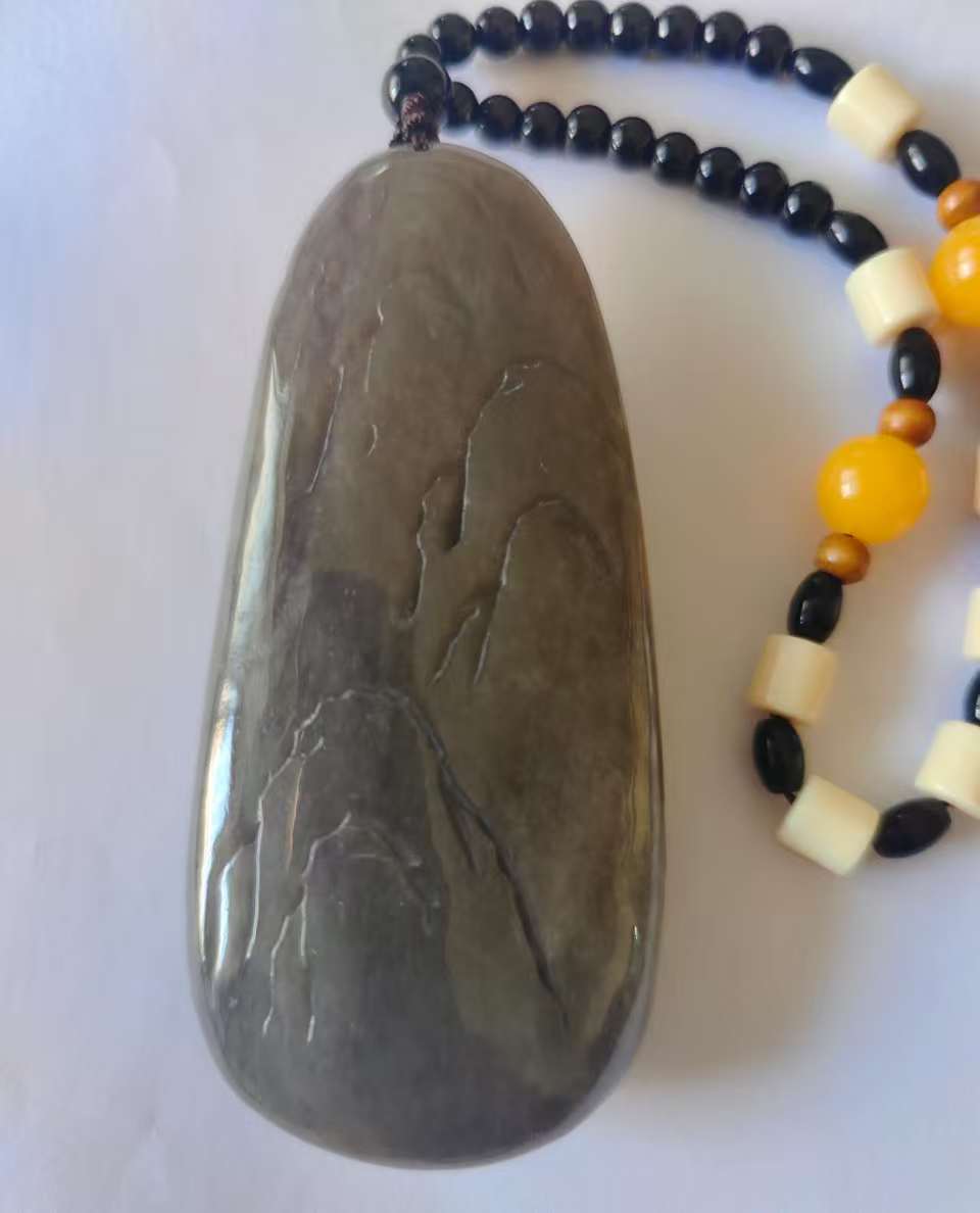 和田玉《镂空山水手把件》