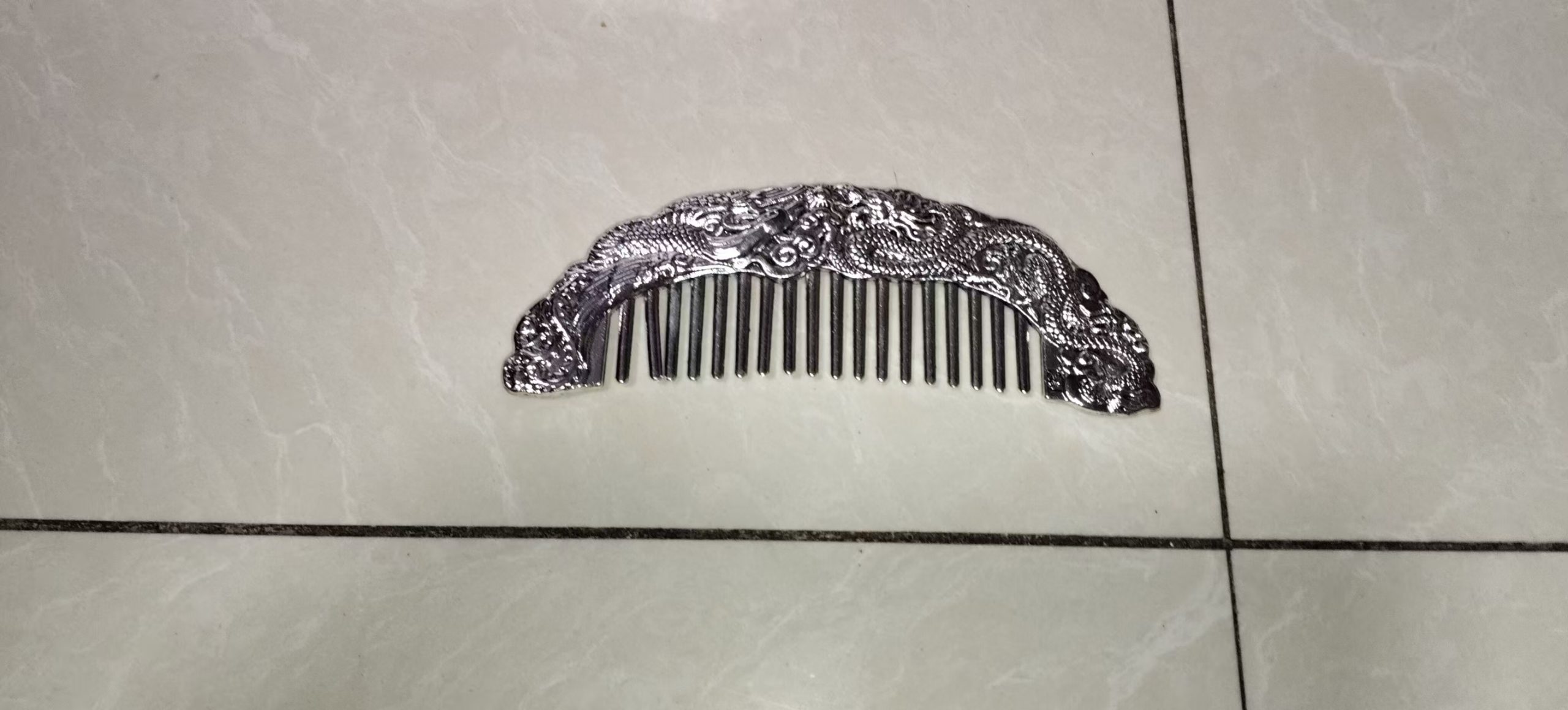 银龙凤纹梳-嘉城艺术交易平台