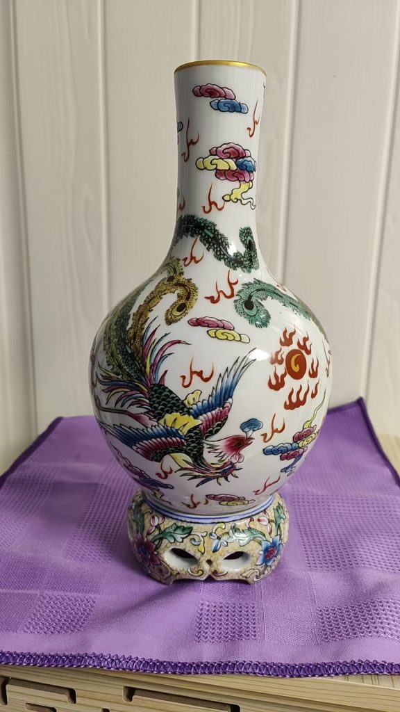 图片[1]-乾隆年制《粉彩凤凰纹转瓶》-嘉城艺术交易平台