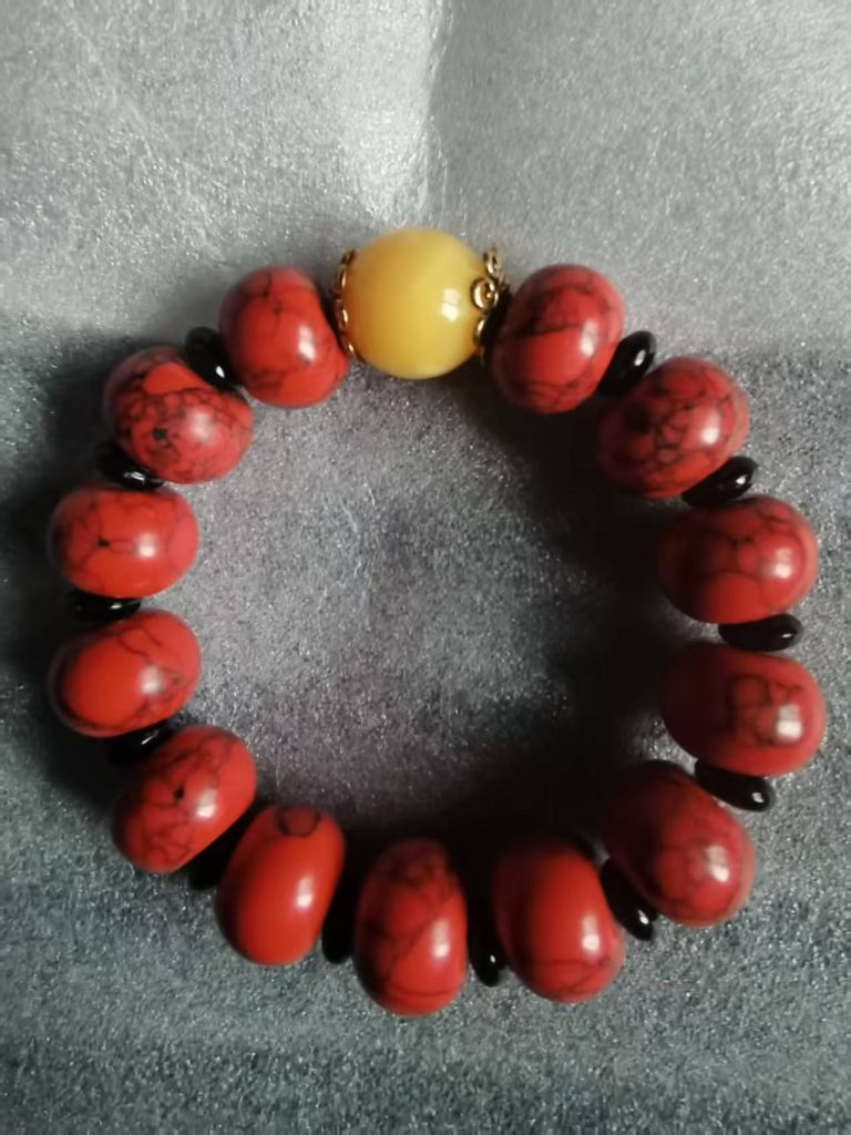 图片[1]-红松石蜜蜡《手串》-嘉城艺术交易平台