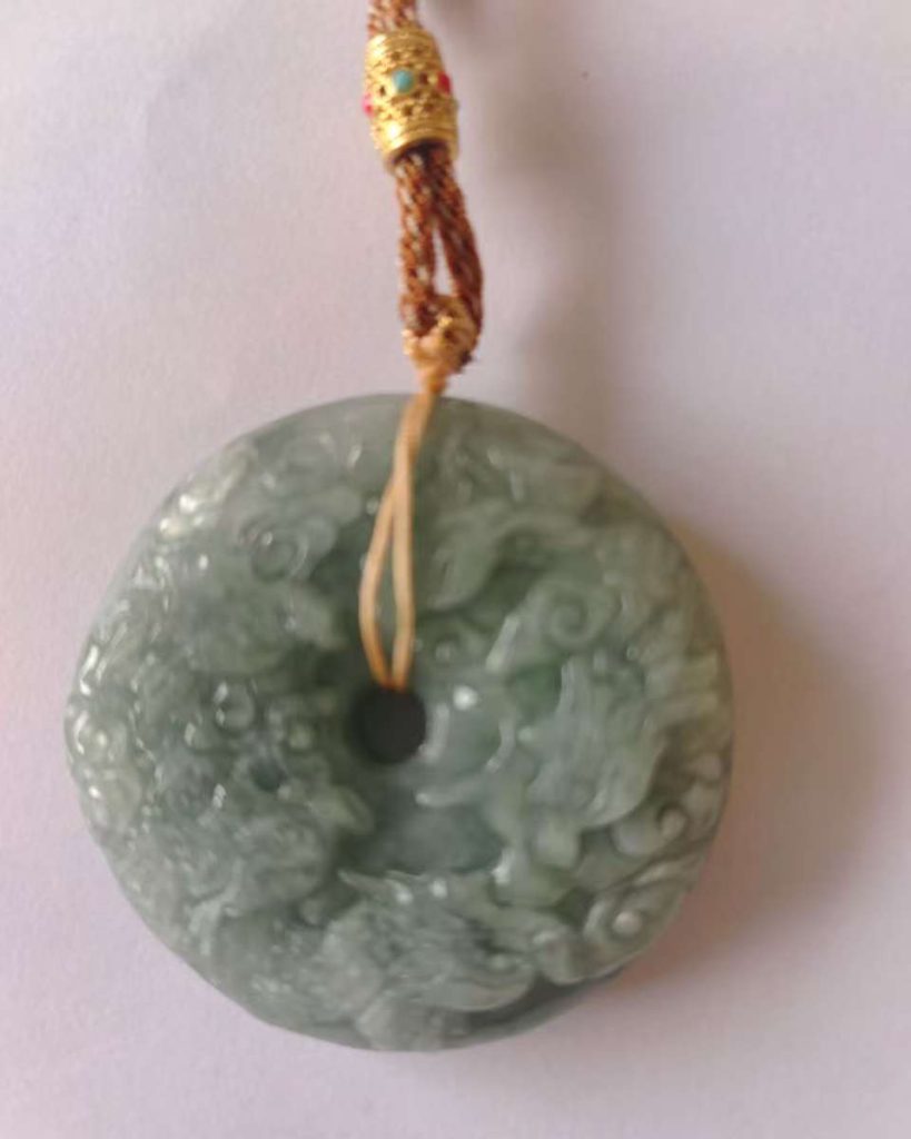 图片[1]-翡翠《九龙护主平安扣》-嘉城艺术交易平台